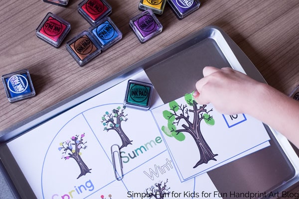 Practice counting up to 20 with a fun sensory approach that turns it into a game: Fingerprint Counting with Seasonal Trees, perfect for toddlers and preschoolers!
