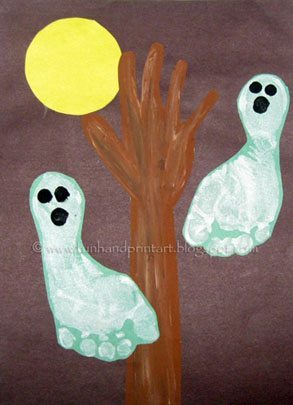 Spooky Halloween Scene with Footprint Ghosts and Hand Shaped Tree