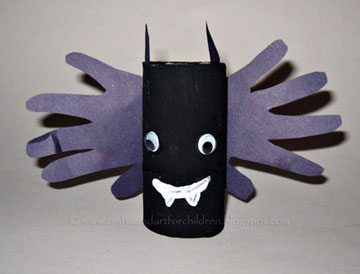 Vampire Bat Handprint Craft made with an empty cardboard tube.