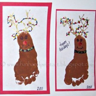 Footprint Reindeer wearing Christmas lights