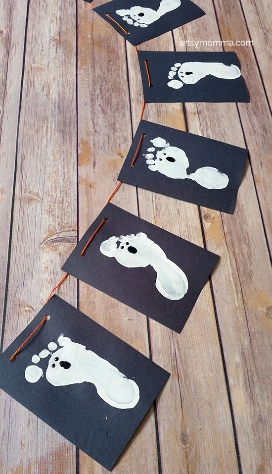 Kid-made Halloween Decorations - Ghost Banner made with Footprints