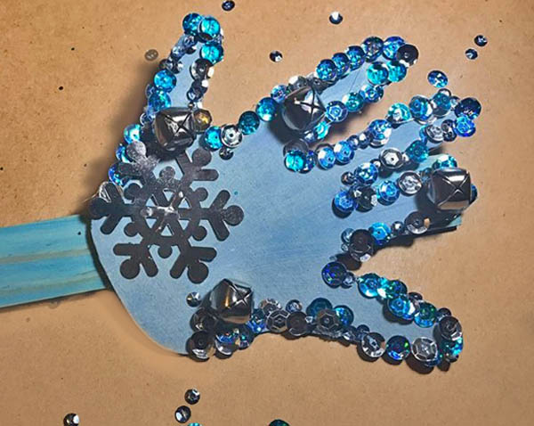 Sparkly New Year's Eve Noisemaker Craft Using a Handprint