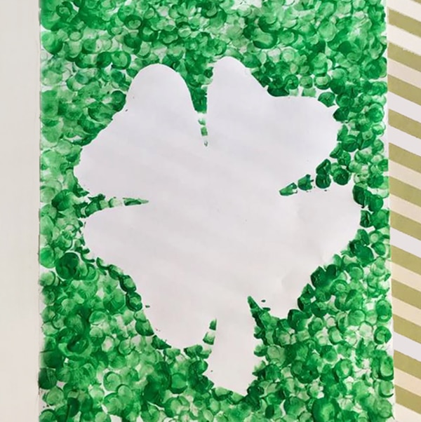 A Fun St. Patrick's Day Craft For Kids: Make a Lucky 4 Leaf Clover Resist Fingerprint Painting