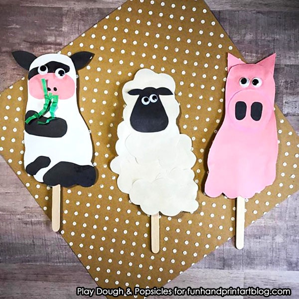 DIY Footprint Farm Animal Puppets On A Stick - Pair with a farm book or use for imaginative play.